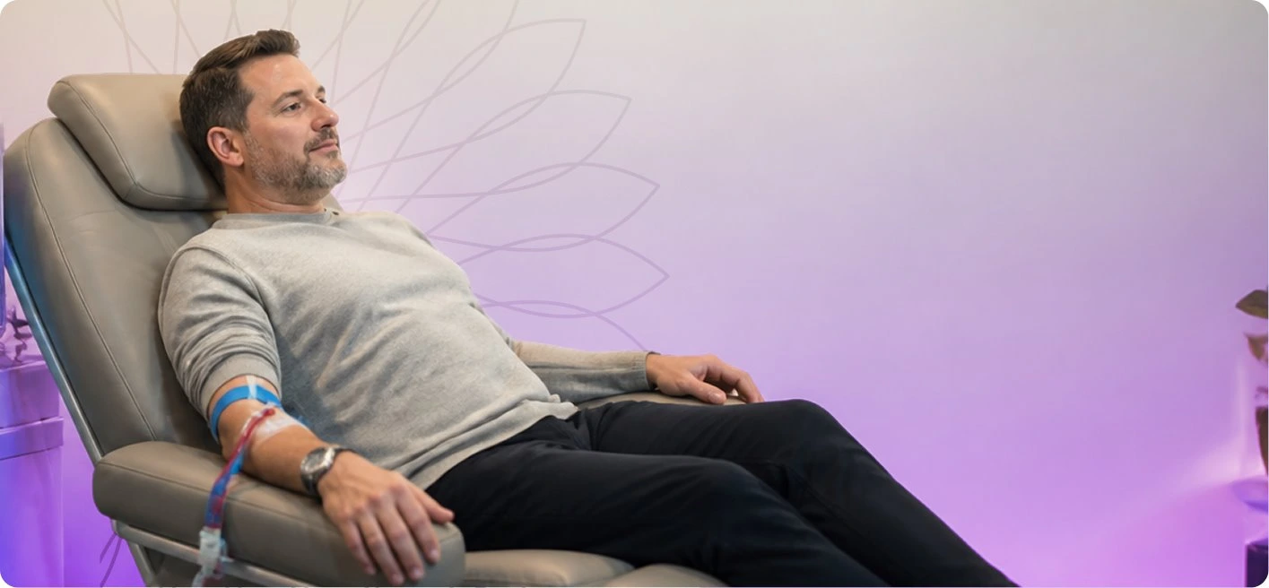 Client relaxing in a recliner during a UVBI session